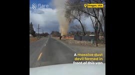 Massive Dust devil Forms in front of driver