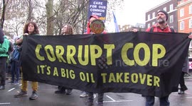 Climate activists rally outside BP's London HQ to demand 'climate justice' and criticise COP28