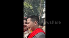 Butterfly flies around newlyweds on their wedding in Qingyuan, China