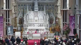 The coffin of Shane MacGowan is brought to the front of  Rosary Church in Nenagh, Ireland