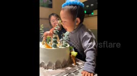 Boy Unexpectedly Bites Flame While Blowing out Birthday Candle in Hebei, China