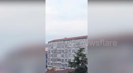 Woman yells at children playing on top of six-storey building