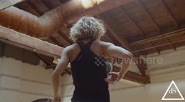 This music video is showcasing people dancing in various types of environments synced to the music.