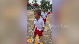 Kindergarten boy sings national song like heavy metal singer