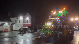 Amazing scenes of over 200 illuminated tractors parade round Mid Wales for charity.