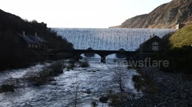 Caban Coch Dam overflowing, Elan Valley, Mid Wales, UK.  13 December 2023.