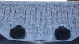 Caban Coch Dam overflowing, Elan Valley, Mid Wales, UK.  13 December 2023.