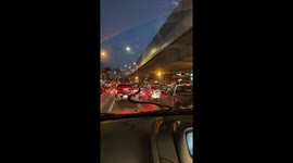 Driver terrified when huge snake emerges on windscreen in Bangkok