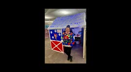 The extreme Christmas coworker decorates her cubicle every year.