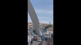 Maneuvering a Massive Wind Turbine Blade Through Town