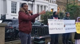 Father of 10 year-old boy allegedly punched by his teacher holds protest outside London school seeking justice for his son