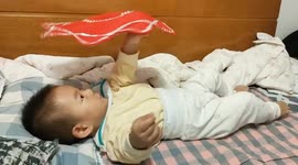 Tiny Prodigy in China: Youngster Masters Handkerchief Twirling