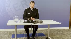 Police take questions from reporters following the arrival of Alex Batty in the UK