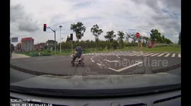 A Thrilling Moment When a Scooter Almost Collided with a Truck in Shanghai, China