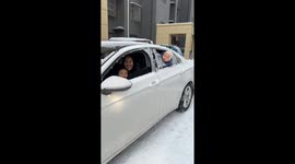 Dad Breaking Ice Covered on Car Window with Baby’s head in Northern China