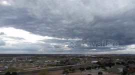 Hyper-lapse with overcast skies over a suburban Neighborhood.