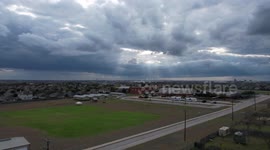 A short hyper-lapse over a rural nieghborhood with skies overcast.