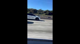 Cheater Car Cruises Down Interstate