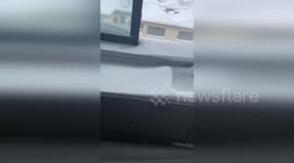 Snow storm turns living room into winter wonderland when resident forgets to close windows