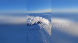 Aerial Spectacle Unleashes Smoke Fury at Karymsky Volcano