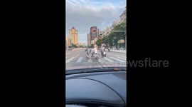 Comical Morning Struggle: Child's Reluctance to School in Guangdong, China