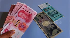 Stockshots: The Chinese Yuan and Japanese Yen are displayed in Yichang, China