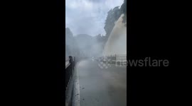 Waterfall Gives Bathes to Passers-by in Chongqing, China