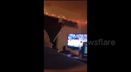 Man reacts hysterically to college basketball buzzer-beater
