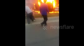 Two people injured after cigarette flicked out of window sets car on fire