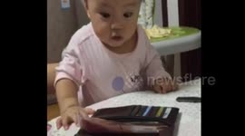 Baby's amazing reaction to finding money in dad's wallet