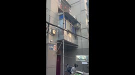 Daring Rescue: Adolescent Catches kitten falling from window ledge in China