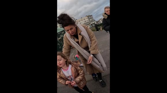 SANTA SURFS THE LAND IN BRIGHTON