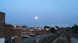 The last full moon of the year rises over Elm Park in Essex