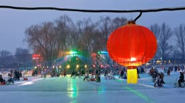 Tourists and citizens skate at Shichahai Ice Rink in Beijing, China