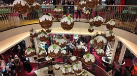 Amazing flying Christmas puddings in Fortnum & Mason