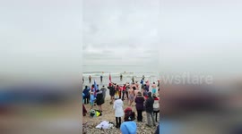 Brave Canadians Dive Into Freezing Watter For The Start of 2024