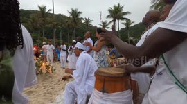 Rio de Janeiro, Brazil December 31, 2023. The origin of the traditional New Year's Eve party on the beaches of Brazil comes from African-based religions.