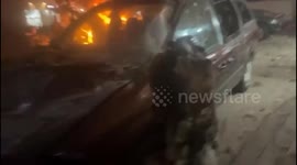 scenes of an explosion that occurred in the Musharrafieh area, inside the southern suburb of the Lebanese capital, Beirut, a short while ago.