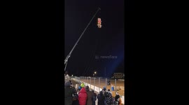 Truck Dropped From Crane For New Year's Celebration