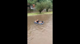 Resourceful relaxation: floating through floodwaters in DIY boat