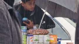 Displaced Palestinians face dour weather at makeshift camp in Khan Yunis