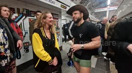 Scores of tube riders strip to their pants during annual underground ride, as a perfect antidote to winter blues