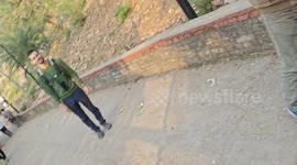 A funny moment captured by mobile phone a monkey activity in Mahakal cave