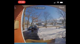 Frozen driveway forces car, driver to slide away