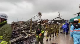 Firefighters begin search operations in fire-ravaged market following Japan quake