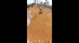 Excavator drivers control excavators moving down steep slopes quickly and professionally
