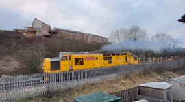 Class 37 locomotives,cracking noise and smoke as it passes my house in Mid Wales.