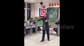 Maths Teacher with Nunchaku Performance at New Year's School Party in Yulin, China