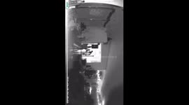 Transparent hooded shadow figure come out of what looks like a portal