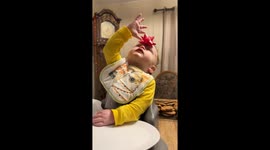 Grabbing things off the forehead can be tough sometimes for a baby